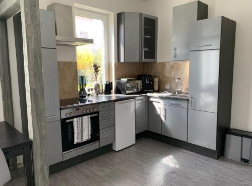 Køkken eller tekøkken på Ferienwohnung im Harz 4