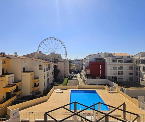 Studio climatisé centre port avec Piscine & Parking