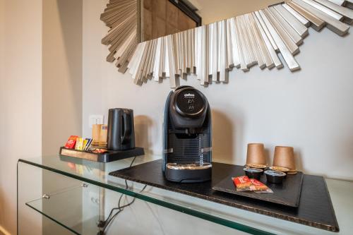 Kemudahan buat kopi dan teh di Luxury Suites in the Heart of Cagliari