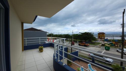 a balcony with a view of a street at Hotel Vila ÁguaMar in Itapoa
