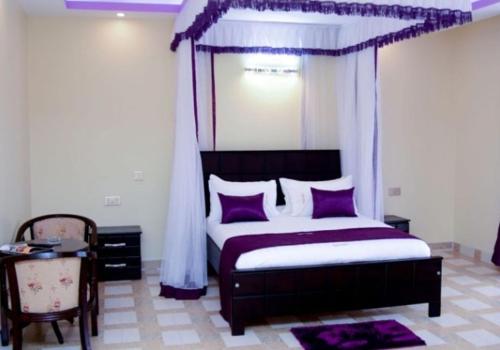 Ένα ή περισσότερα κρεβάτια σε δωμάτιο στο Rubax motel mbarara