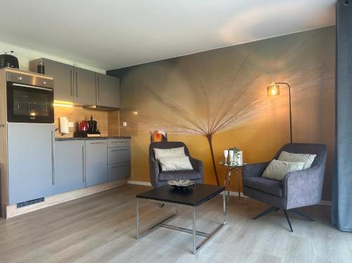 A kitchen or kitchenette at FACT Apartments