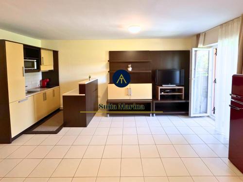 a kitchen with a sign that reads sulfur marriott at SUITA MARINA - Near Beach with Terrace & 2 Parking Spaces at Marina Portoroz in Portorož