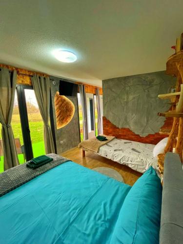 Postel nebo postele na pokoji v ubytování Apartmani Krupajsko Vrelo