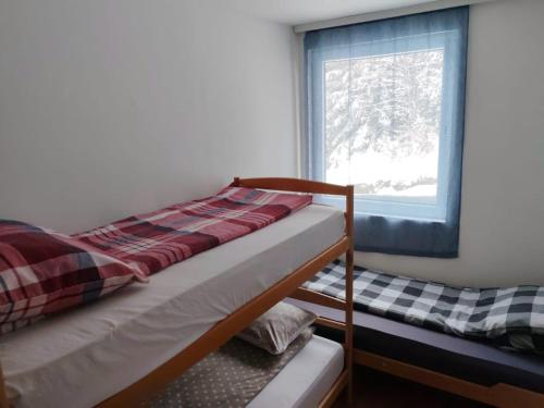 Una cama o camas en una habitación de Kuca za odmor ''Djurovic''