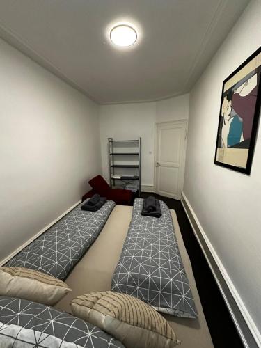 Ένα ή περισσότερα κρεβάτια σε δωμάτιο στο Stylish in Sankt Johann near Novartis with Sauna