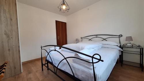 Postel nebo postele na pokoji v ubytování Dolomiti Rock