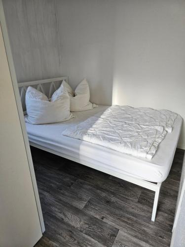 Ένα ή περισσότερα κρεβάτια σε δωμάτιο στο Ferienhaus Tulpenring