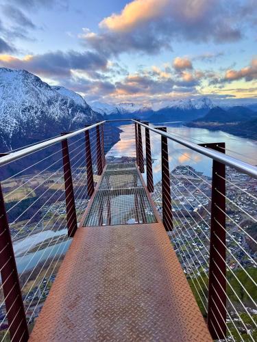 a view from the top of a viewing deck of a mountain at Bispen Villa Utsikten in Åndalsnes