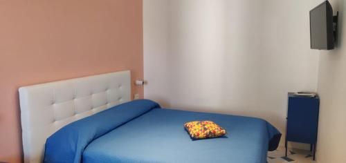 Katil atau katil-katil dalam bilik di Casa dei Nonni Maiori