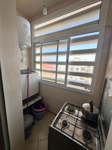 Η κουζίνα ή μικρή κουζίνα στο Residence afoulki 2 hay mohammadi