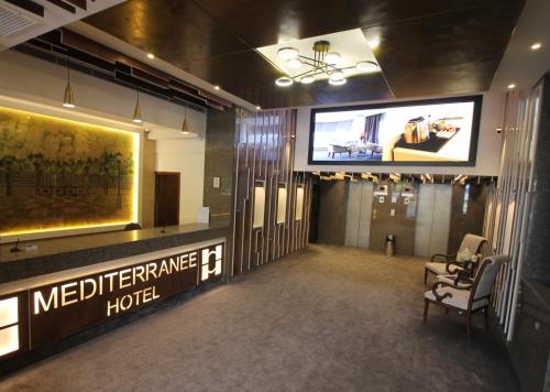Hotel Méditerranée Beyrouthにあるテレビまたはエンターテインメントセンター