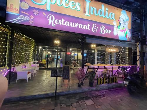 a restaurant with a sign that reads princess india restaurant and bar at Bed & Breakfast Pattaya in Pattaya