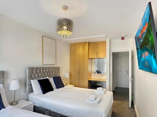Postel nebo postele na pokoji v ubytování Granada Apartments Derby Road
