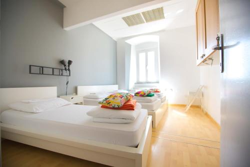 Llit o llits en una habitació de Hostel Kosy