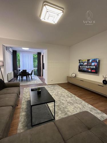 Televisor o centre d'entreteniment de Venus apartaments2