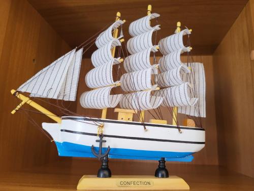 a model boat on a display in a room at A due passi dal mare Lovely Apartment Viareggio in Viareggio