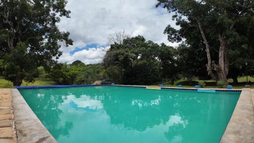 Bazén v ubytování Águas Vivas Hotel Fazenda nebo v jeho okolí