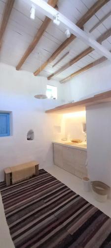 Ένα ή περισσότερα κρεβάτια σε δωμάτιο στο Solitude Studio - Serifos Chora