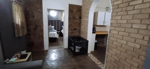 Postel nebo postele na pokoji v ubytování Risima Guest Lodge Hazyview
