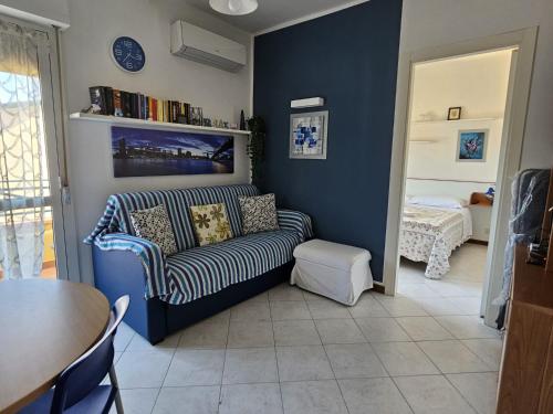 Ένα ή περισσότερα κρεβάτια σε δωμάτιο στο Il Castelluccio residence