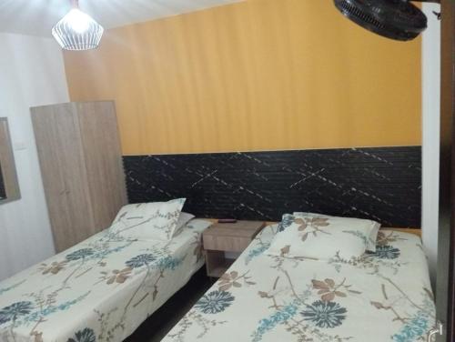Postel nebo postele na pokoji v ubytování Hotel Lesus