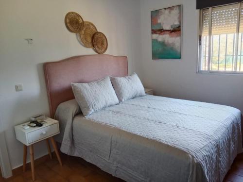 Postel nebo postele na pokoji v ubytování Finca Laurel