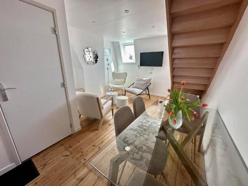 TV a/nebo společenská místnost v ubytování Le Duplex Appartement