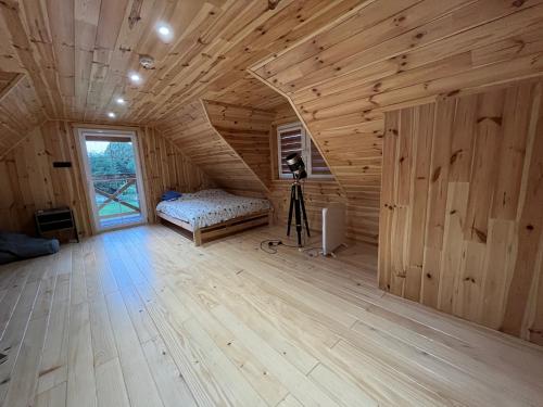 Postel nebo postele na pokoji v ubytování Domek Pod Gwiazdami