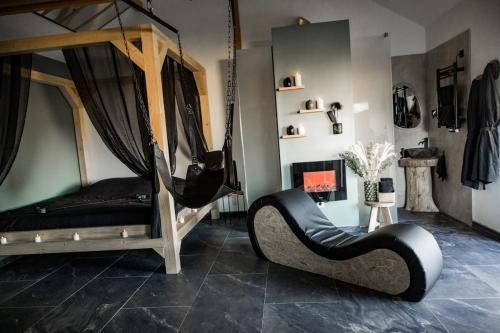 a room with two bunk beds and a chair at Love-Room BreakyWell in Rémelfang