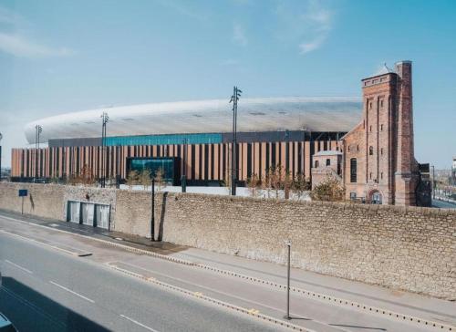 a building on the side of a road next to a street at RST Bramley Boutique in Liverpool