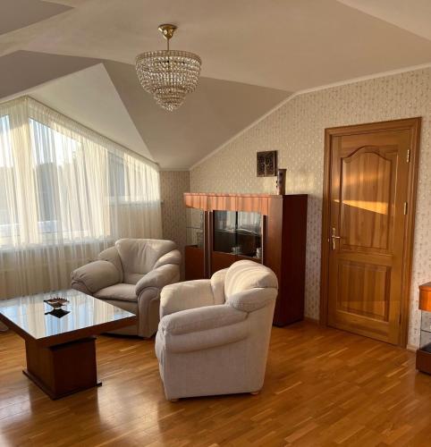 Гостиная зона в Family holiday house with sauna