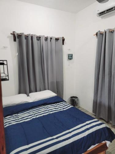Una cama o camas en una habitación de Casa Mara