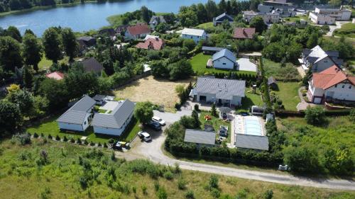 an aerial view of a house with a driveway at Apartamenty Dolina Wisełka in Wisełka