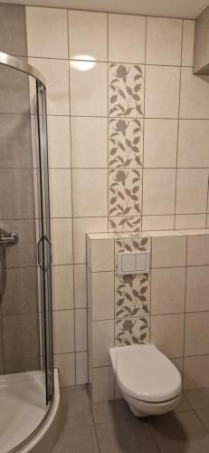 Kúpeľňa v ubytovaní Apartament Jedynka Villa Incognito