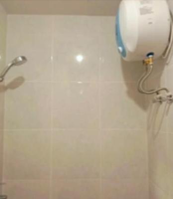 Ванная комната в Delf Apartment CPI Makassar