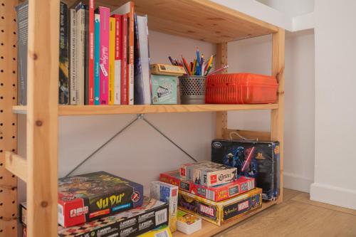 a book shelf filled with lots of books at L'Ulivo tourist accommodation in Bracciano