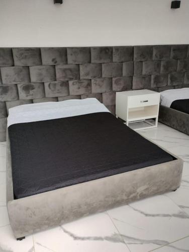 Кровать или кровати в номере Hermosa casa vista al lago