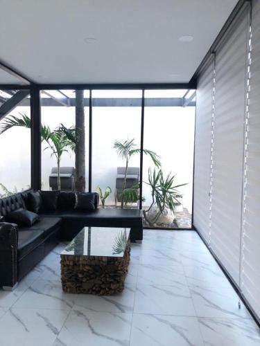 Гостиная зона в Hermosa casa vista al lago