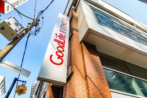a store sign on the side of a building at CHOL Furnished Suites Heart of Downtown Toronto, 2 Beds, Free Parking, CN Tower View in Toronto