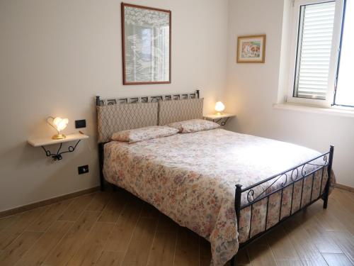 Posteľ alebo postele v izbe v ubytovaní Il Poggio degli Antichi Sapori - Residence