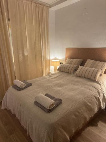 Ένα ή περισσότερα κρεβάτια σε δωμάτιο στο BeHappy Apartment