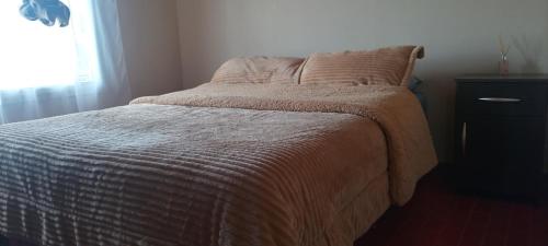 Ένα ή περισσότερα κρεβάτια σε δωμάτιο στο Vergniaud 70