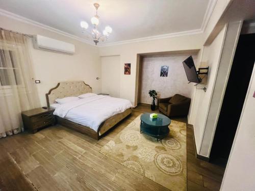 Postel nebo postele na pokoji v ubytování Cairo Airport Inn