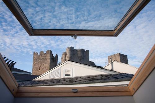 a view from the roof of a house with two towers at Hotel Casa de Caldelas in Castro Caldelas