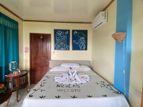 Letto o letti in una camera di Santa Claus Hilltop
