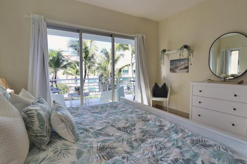 Ένα ή περισσότερα κρεβάτια σε δωμάτιο στο Charming TSI Punta Cana with Spacious Interior