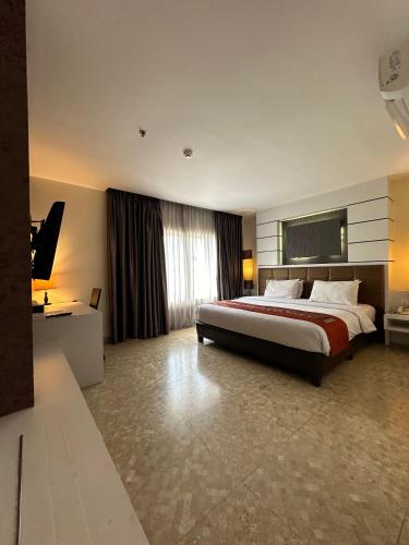 d'JHIA HOTELにあるベッド