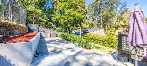 a skate park with a ramp and an umbrella at 4BR Castle Hill Home Garage Near Mall & Park in Castle Hill