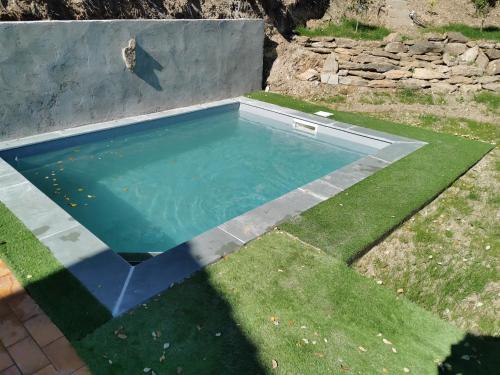 Πισίνα στο ή κοντά στο Maison avec vue sur la mer et piscine